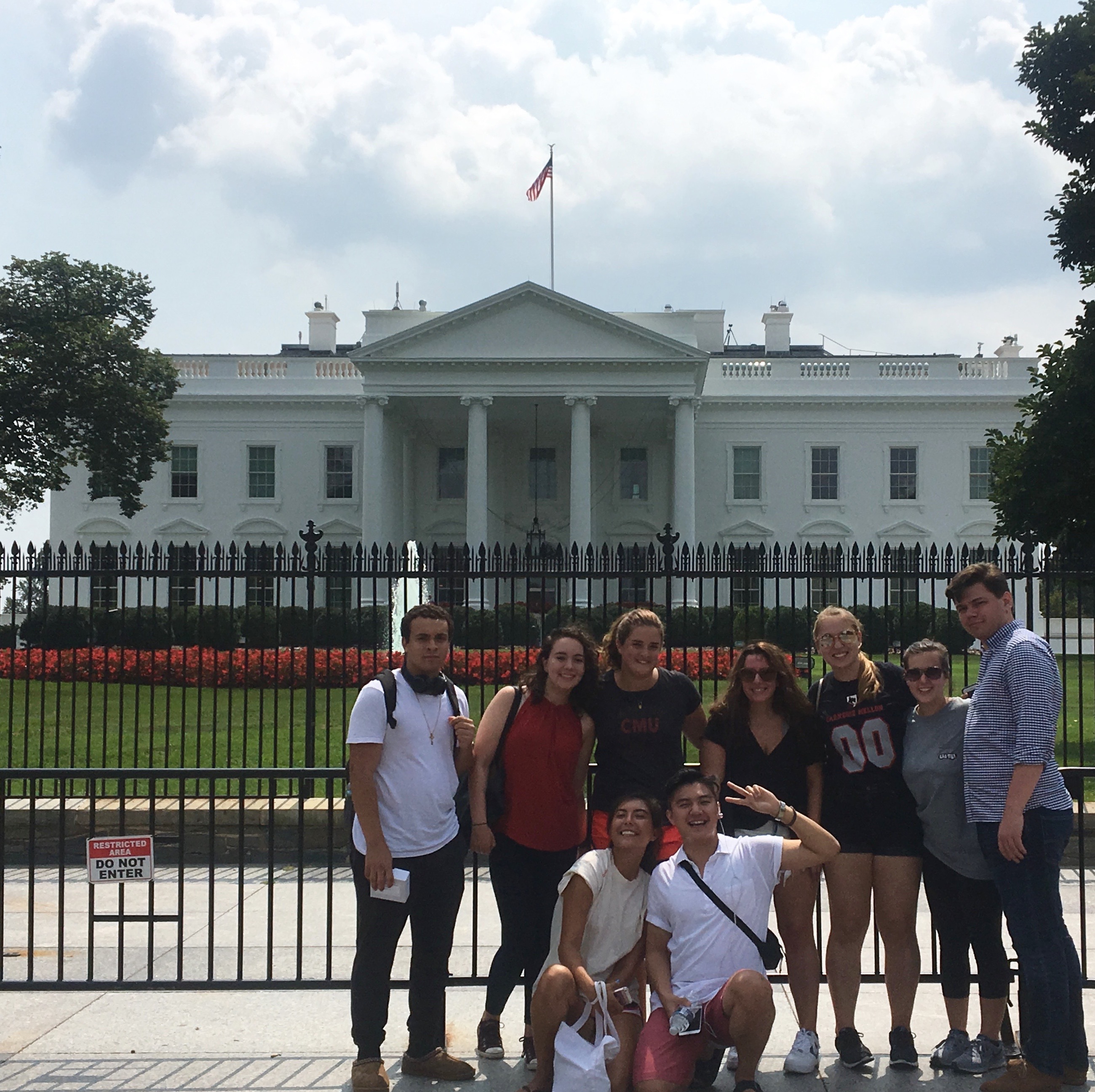 Students pose in front of the White House